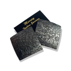 Vintage embossed silver tone floral earrings 80s unworn vintage